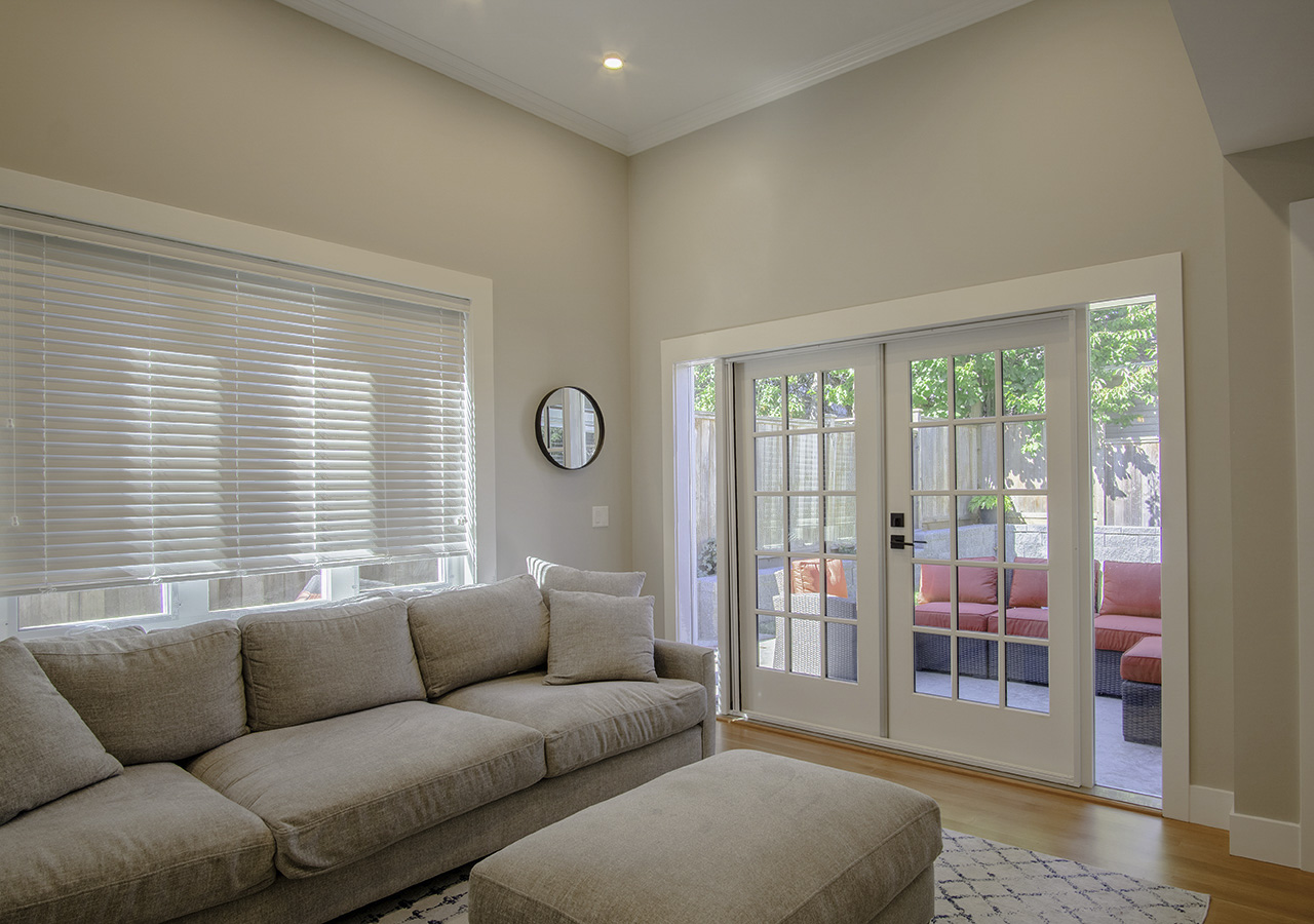 Living room with french doors to the patio — New Westminster
